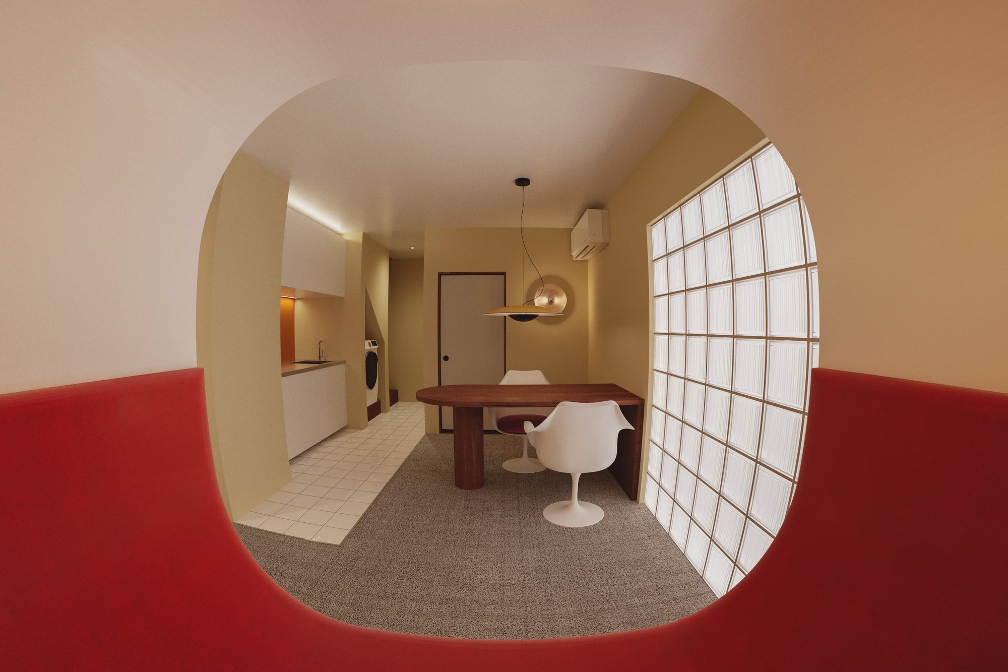 A rounded red alcove frames the dining room beyond.